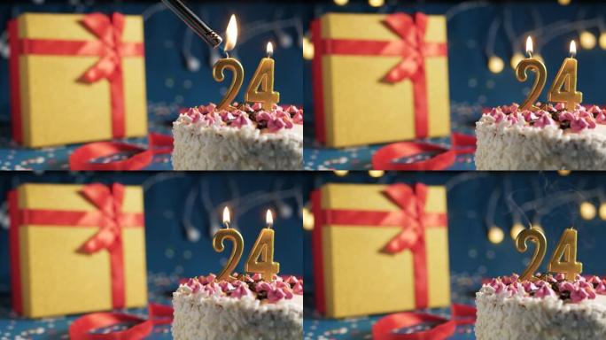 白色生日蛋糕编号24点灯燃烧的金色蜡烛，带灯的蓝色背景和用红丝带绑起来的礼物黄色盒子。特写