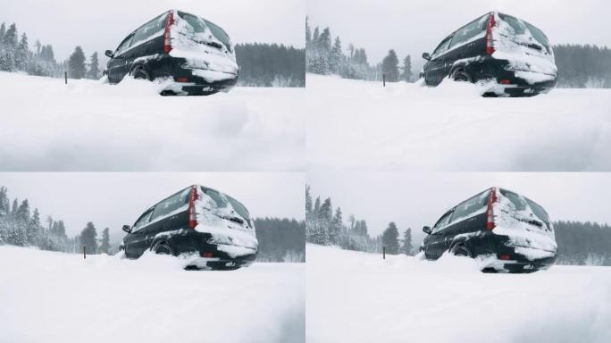 雪下。汽车POV，在积雪覆盖的道路上行驶，第一场雪落下。