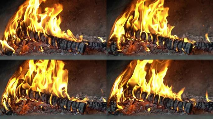 柴火在传统烟囱中燃烧。火在烤箱中燃烧。壁炉中的木头和余烬。