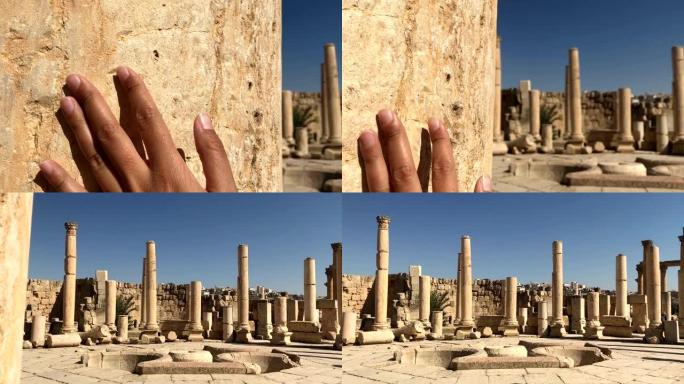 女性手触摸古罗马古城遗址、旅游理念、历史建筑、文明景观