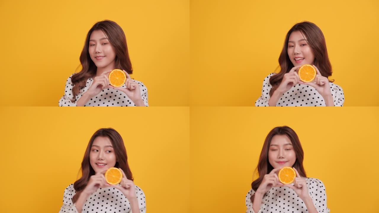 橙色水果美女亚洲女人