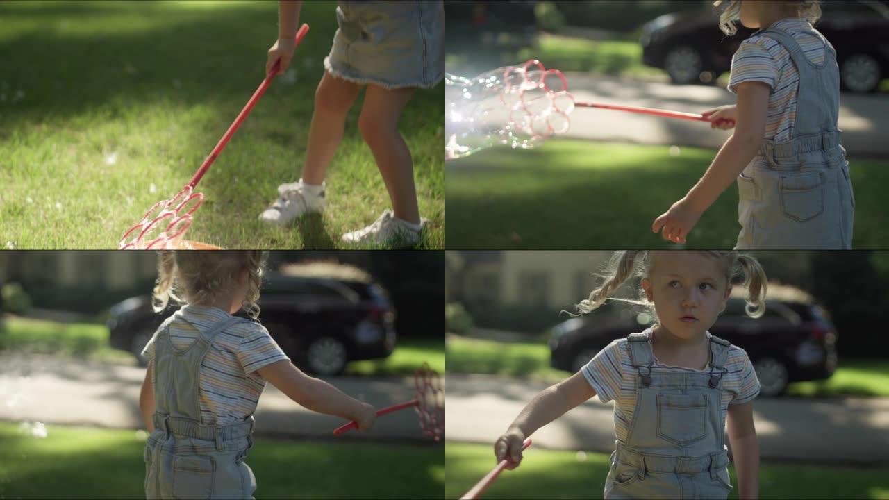 一个小女孩用慢动作的大泡泡棒制造巨大的气泡