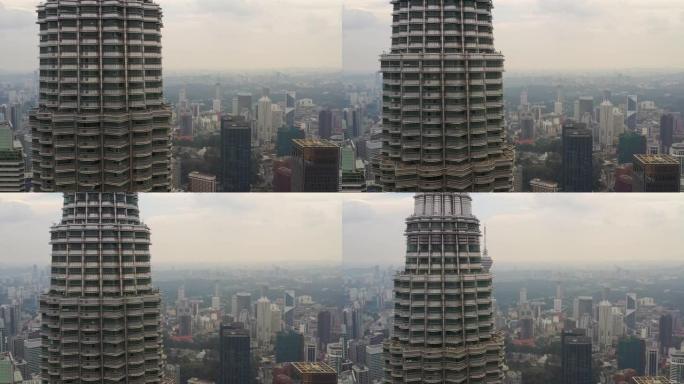 吉隆坡城市景观日时间市中心著名塔楼空中正面全景4k马来西亚