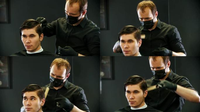 理发师在颈背镜反射上刷年轻男子客户的湿头发