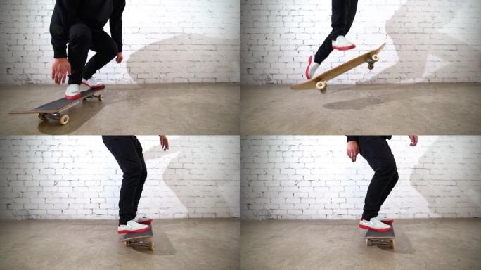 滑板手表演滑板技巧-360在混凝土上流行它。运动员在白色背景上练习跳跃，为比赛做准备。极限运动