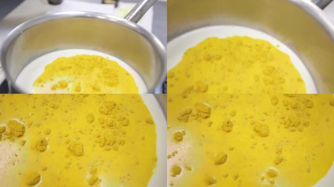 Chocolatier的厨房-将姜黄倒入沸腾的奶油中
