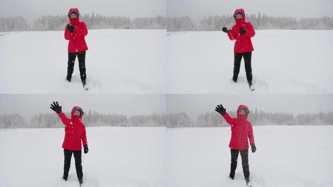 亚洲女子扔雪球男子雪花玩雪球