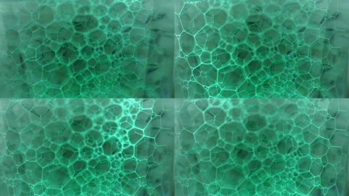 彩色肥皂泡沫与爆裂气泡背景。摘要生物结构，大分子模式。电子x射线墨水填充了在液体中形成的大量气泡。自