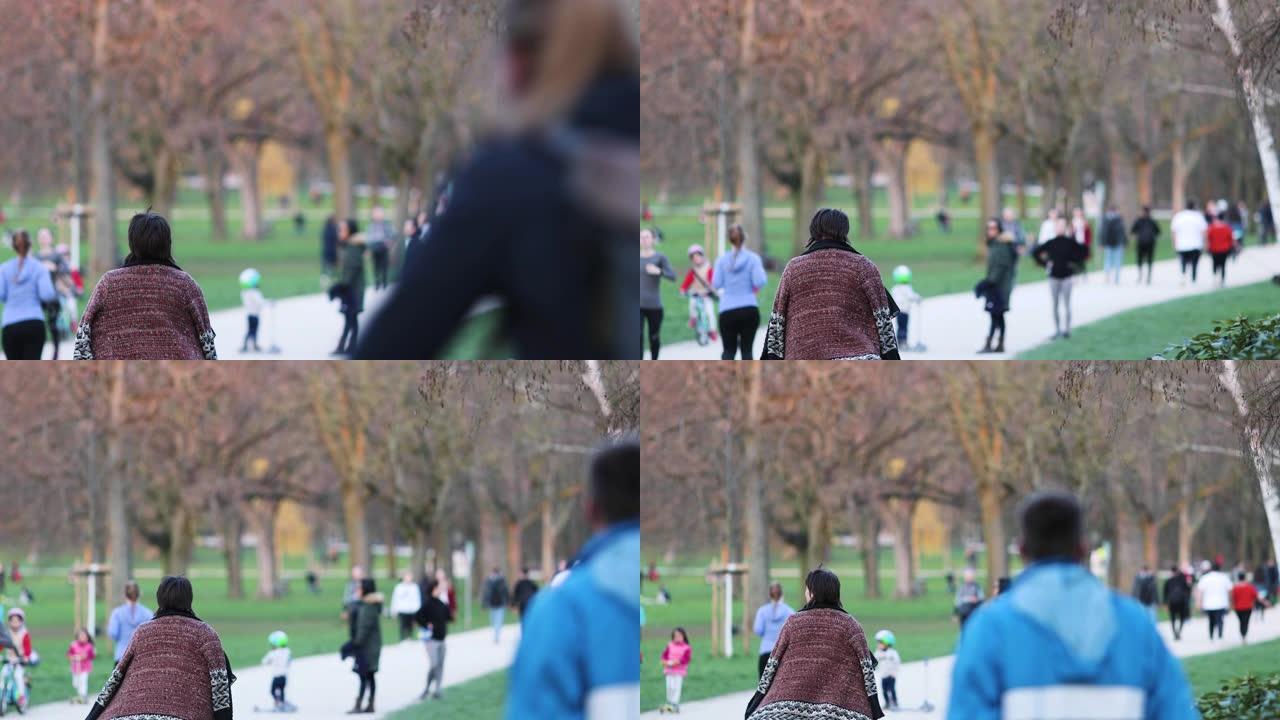 公园里男孩儿脚的低角度跟踪镜头