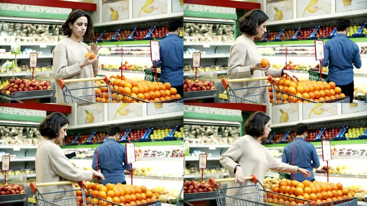 女人在超市买水果女人在超市买水果外国人笑