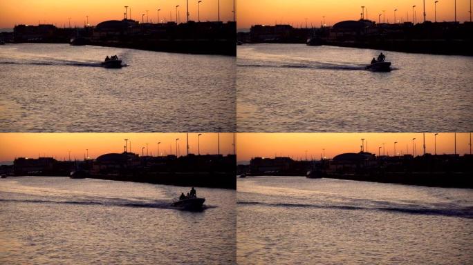 早上在菲乌米奇诺港口钓鱼的小船。