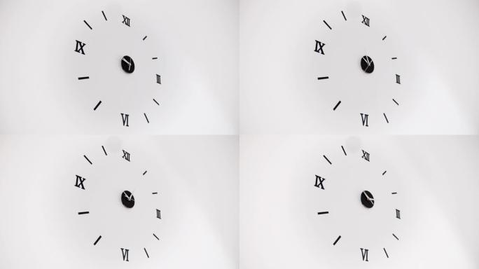 白色背景上的时钟和时钟指针的移动。三个箭头指针快速移动的延时时钟