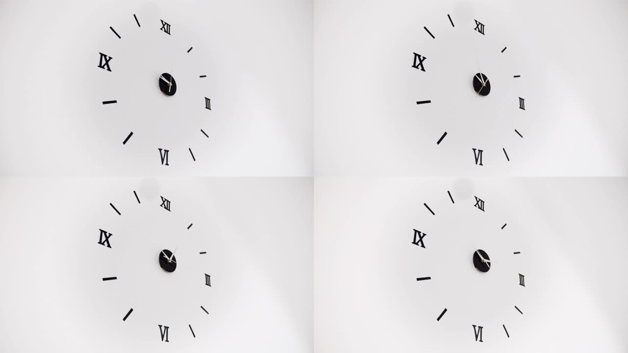 白色背景上的时钟和时钟指针的移动。三个箭头指针快速移动的延时时钟