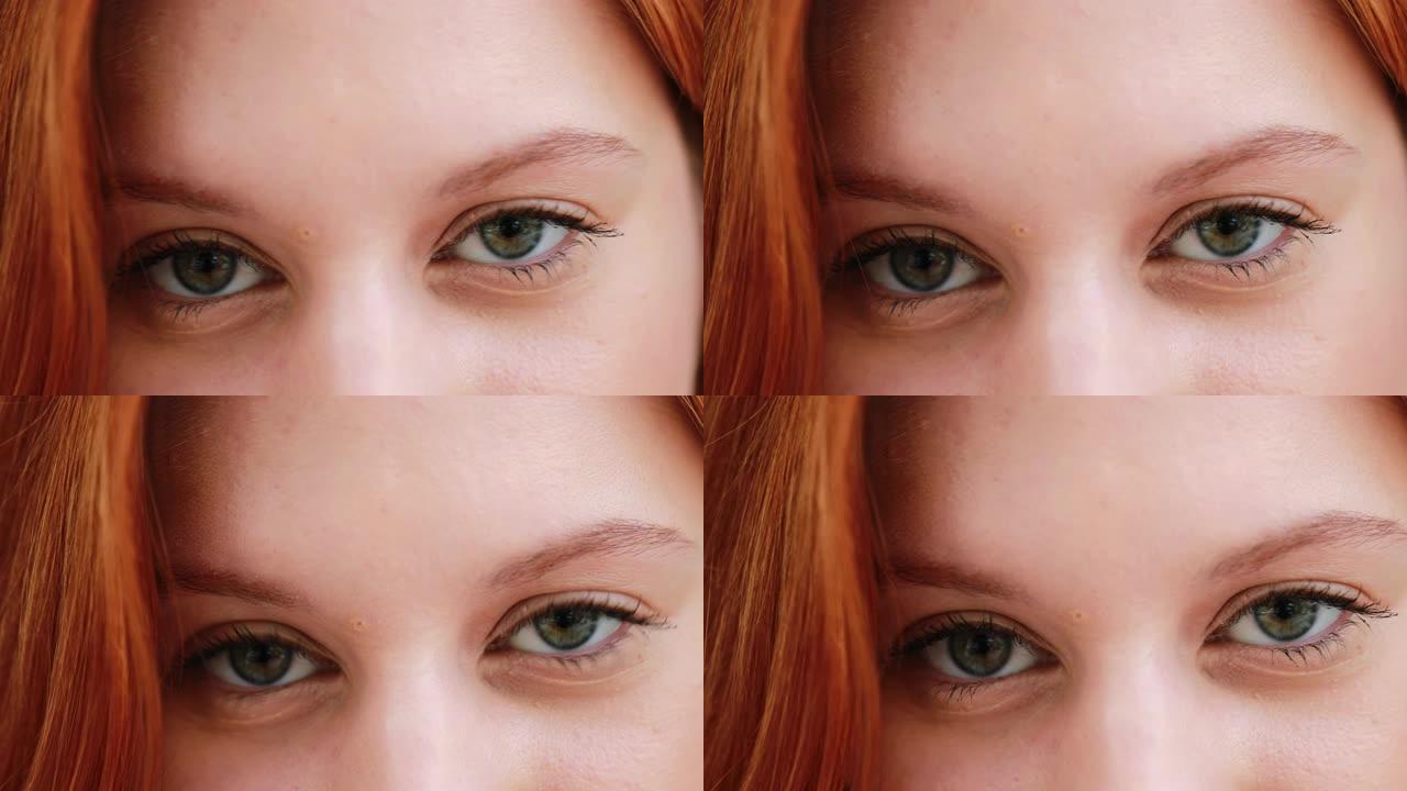 绿眼睛红发女孩脸特写