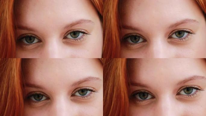 绿眼睛红发女孩脸特写