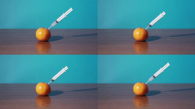 注射器注射到橘子里