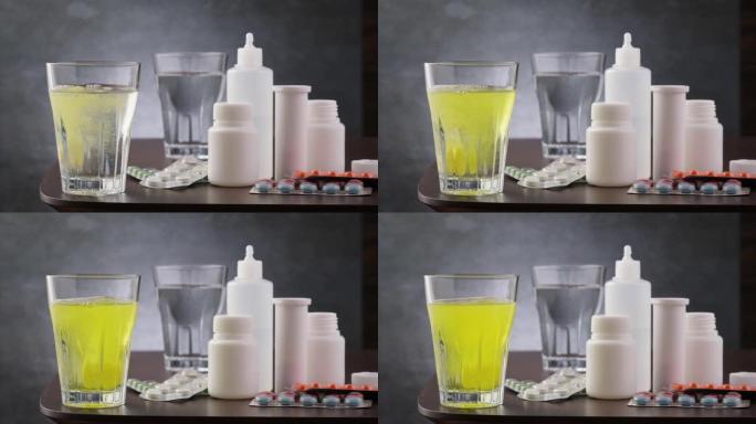泡腾片维生素c下降并溶于水的玻璃中。预防arvi或流感