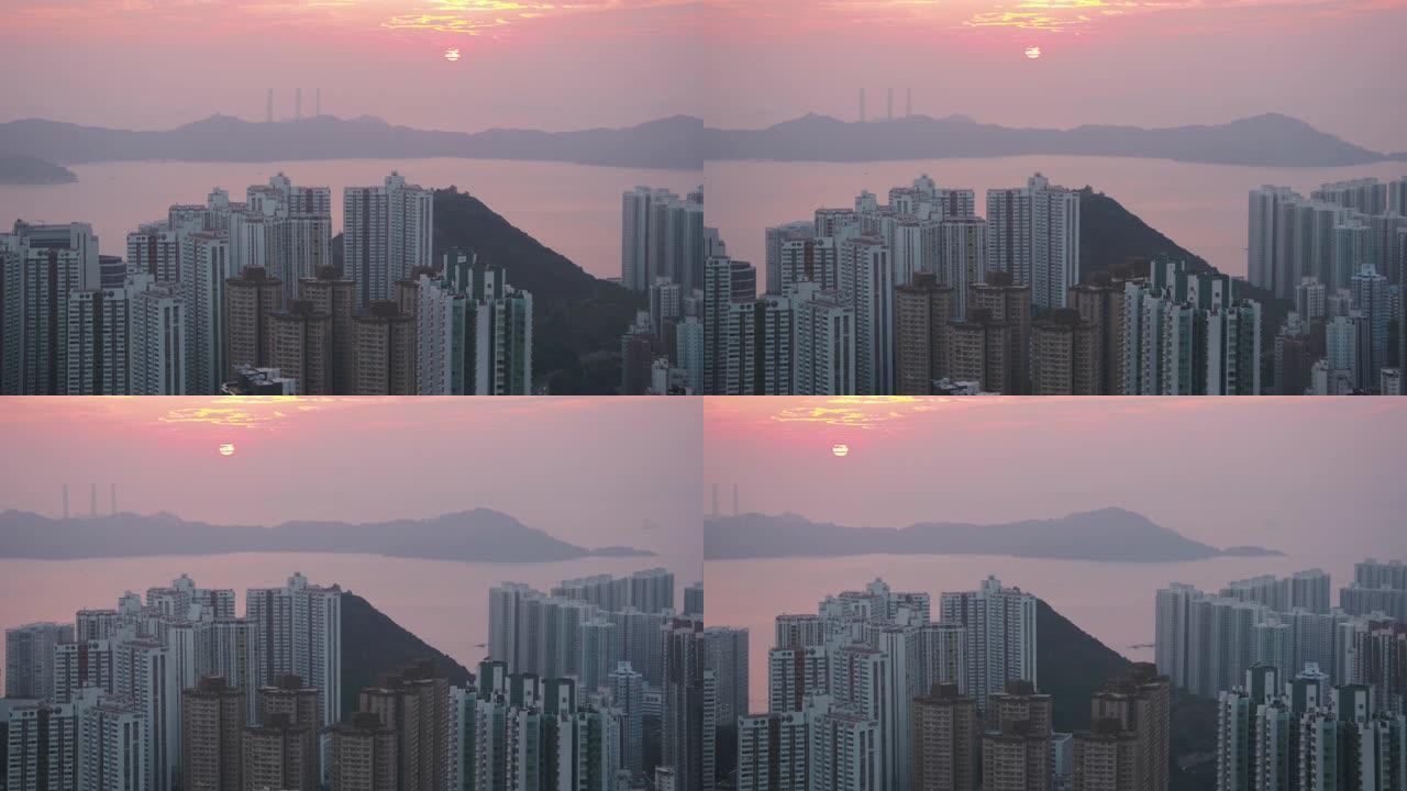 日落时分，香港空中v157特写镜头在公寓大楼周围低空飞行