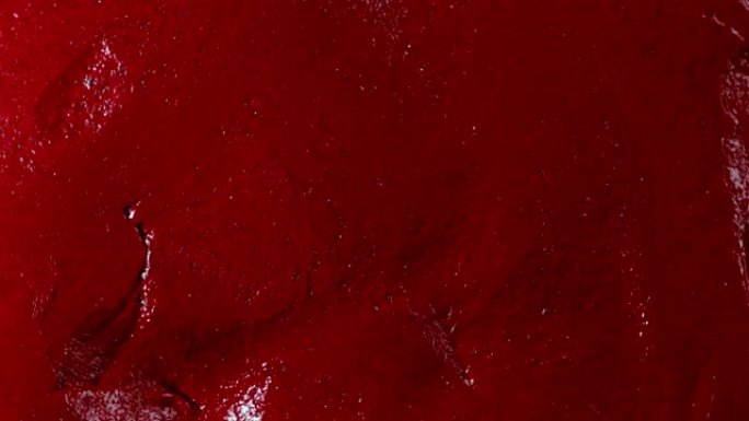 血红色湿粘液腻子表面纹理，缓慢旋转/循环