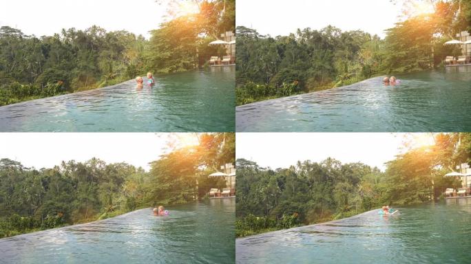 父女玩耍父女玩耍游泳池