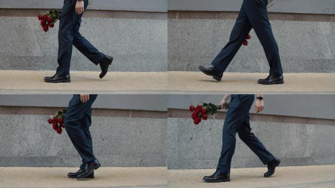 特写镜头男子在街上拿着玫瑰。男子手持红玫瑰在街上