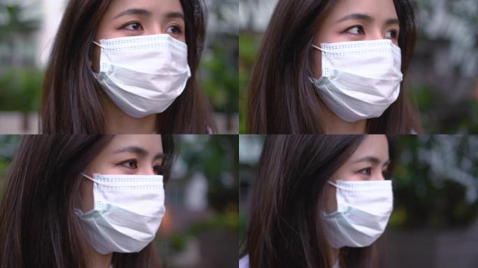 4k亚洲年轻女子戴着防护口罩。希望灵感动机场景，医疗保健概念，病毒covid19，全球问题，boke
