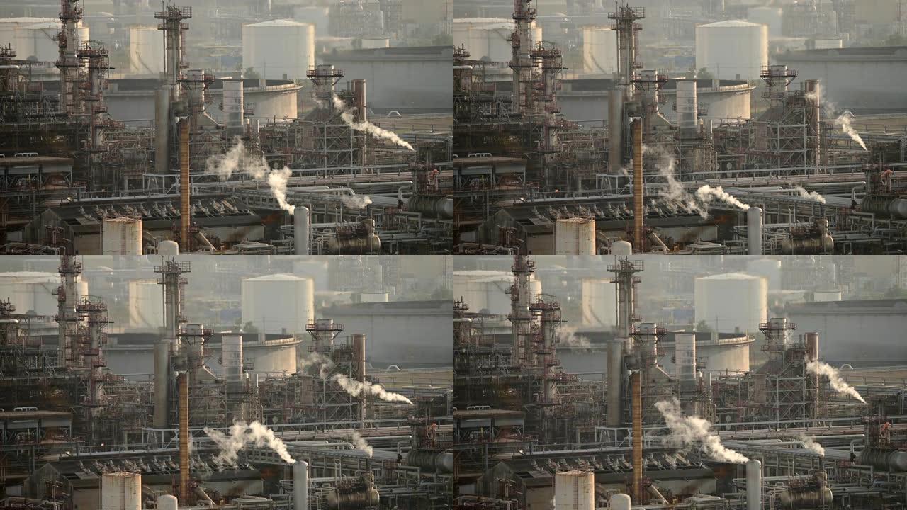 日出时炼油厂冒烟。时间流逝。