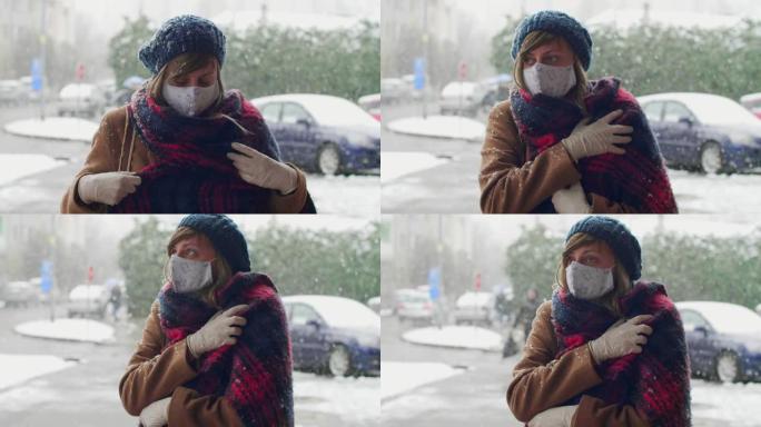 冬天在街上戴着防护面罩和手套的女人的肖像。