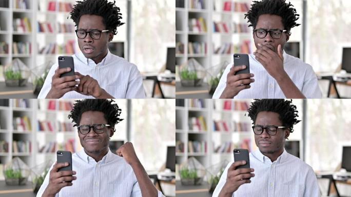 年轻的非洲男子失去了智能手机