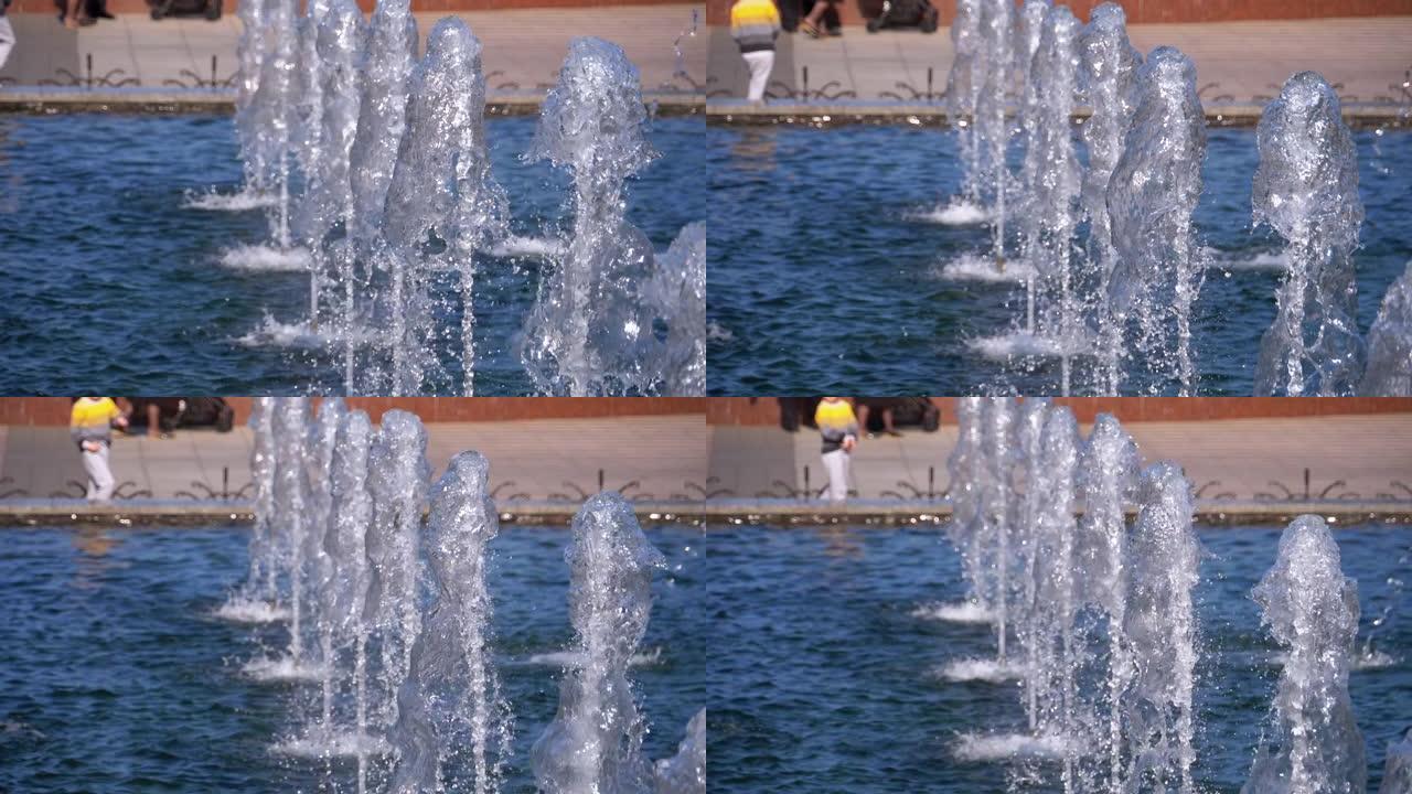 喷泉在180 fps慢动作。特写。喷水飞溅