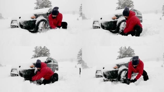 雪下。汽车POV，在积雪覆盖的道路上行驶，第一场雪落下。活跃的高级男子从车里舀雪。