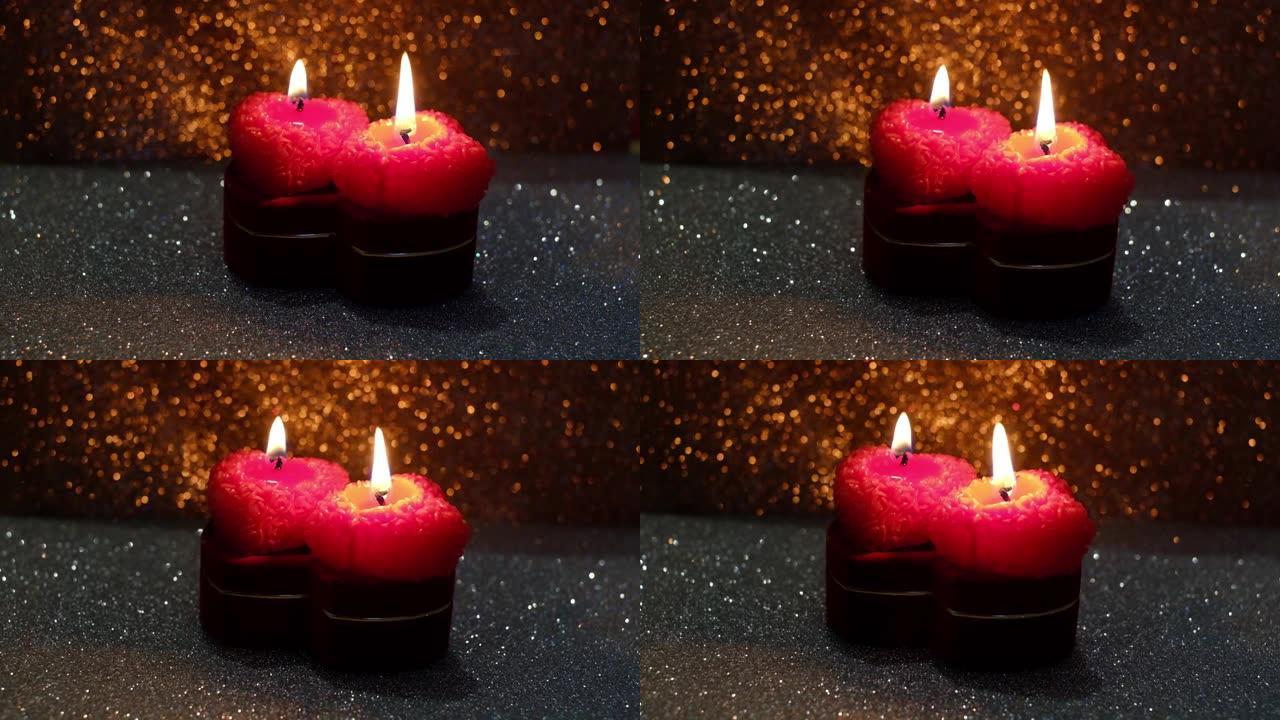情人节，在闪亮的背景上燃烧着蜡烛的框架
