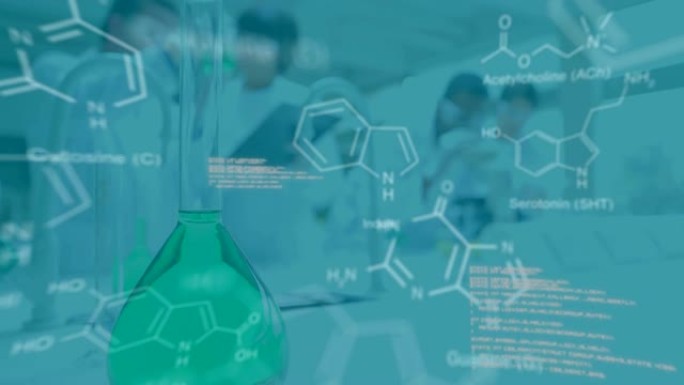 当白色数据在前景中移动时，科学家在实验室工作