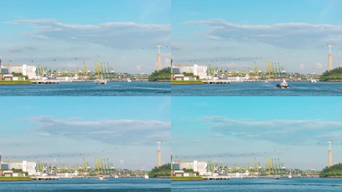 圣淘沙港和工业港口的水上交通和起重机背景，延时视频