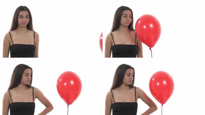 迷人的孤独女人推开红色气球，象征着爱。真实情感概念。孤立，在白色背景上
