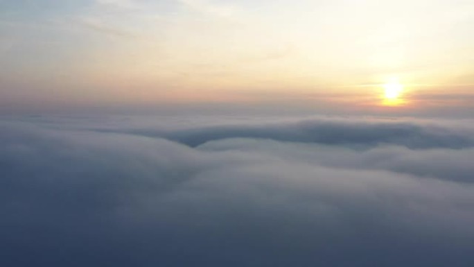 Stormy purple-blue clouds at sunset, drone view.