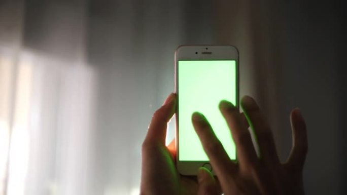 女人使用智能手机，后视图，绿屏，4K