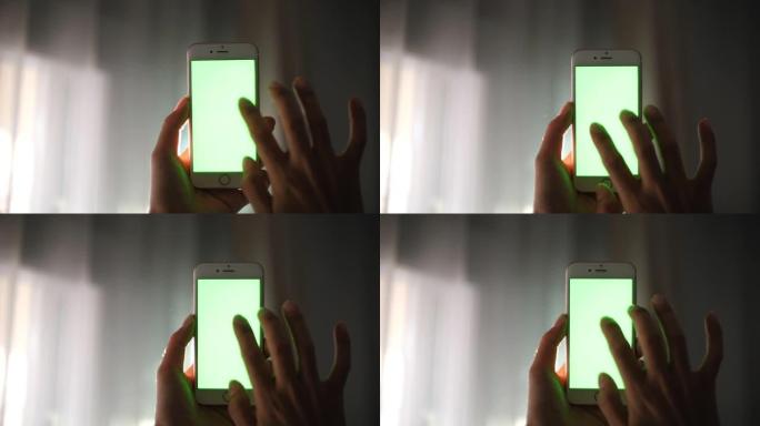 女人使用智能手机，后视图，绿屏，4K