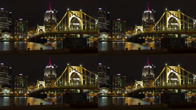 美国宾夕法尼亚州匹兹堡的风景优美的夜晚时光倒流天际线和海滨大桥