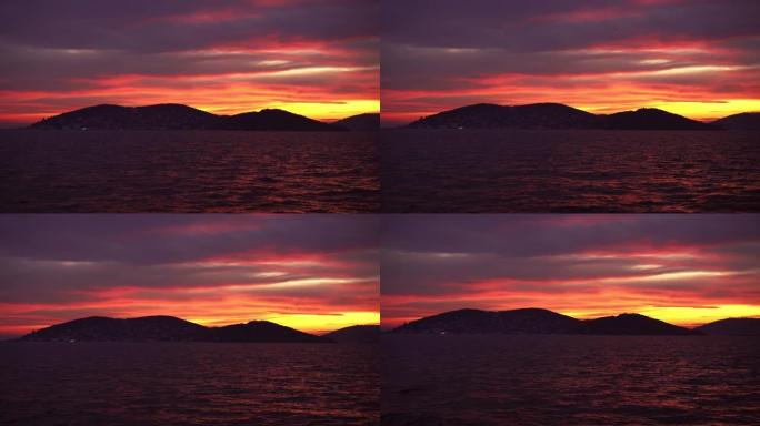 在伊斯坦布尔日落时从船上取走的王子群岛景观