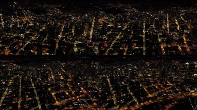 西雅图空中v90夜间在市中心滨水区上空飞行，可欣赏城市景观