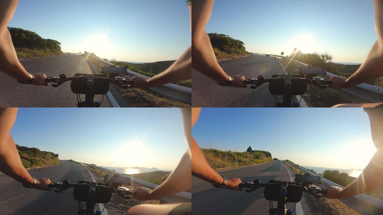 POV拍摄运动员骑自行车的男子骑自行车在路上ponza岛在日落。