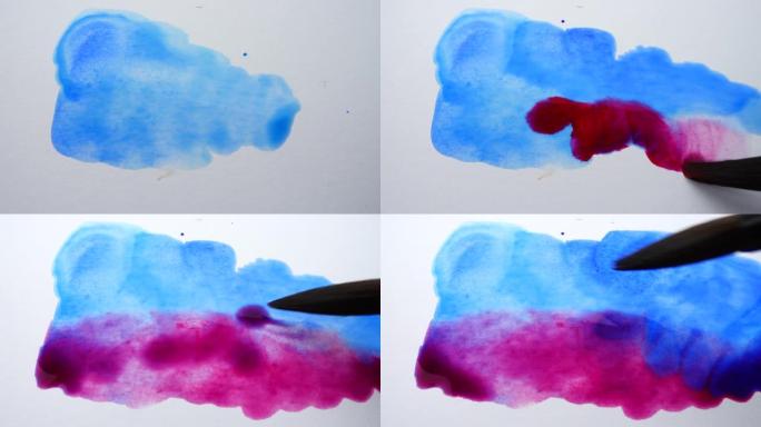 用水彩颜料在纸上画画。