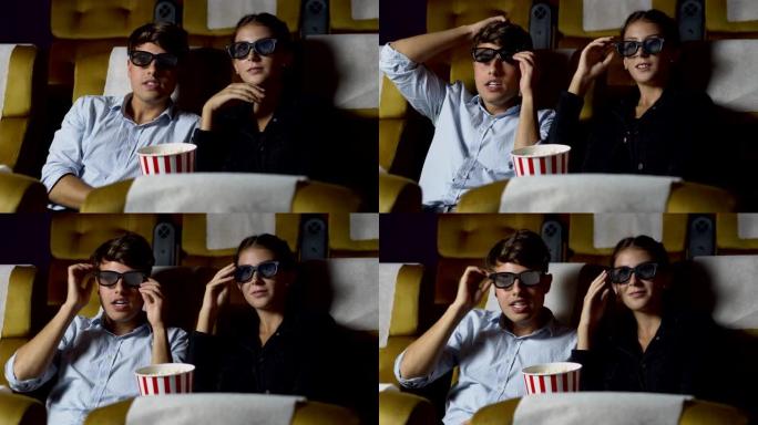 男人和女人在电影院看3D电影