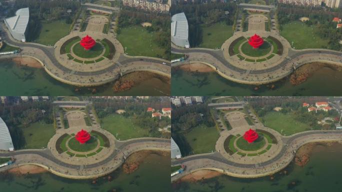 青岛市晴天步行湾著名红色纪念碑交通广场空中俯拍全景4k中国