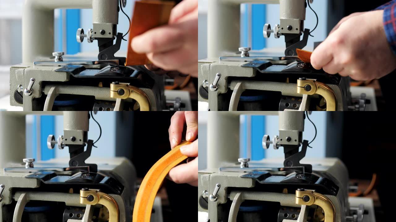 概念工厂生产的皮包。大师在一台特殊的机器上切割薄皮革层，以便进行以下加工。