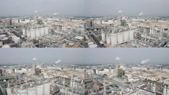 带化工厂的工业区鸟瞰图。工厂冒烟的烟囱