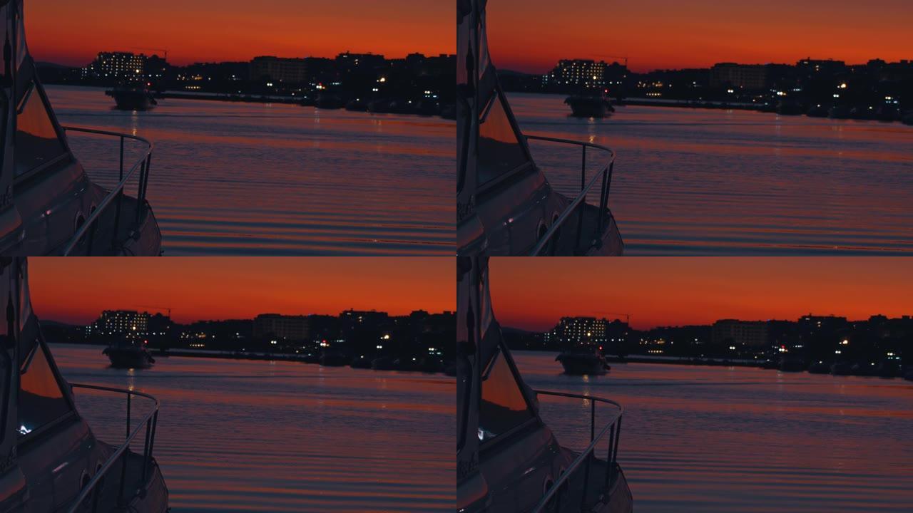 日落时码头上的游艇