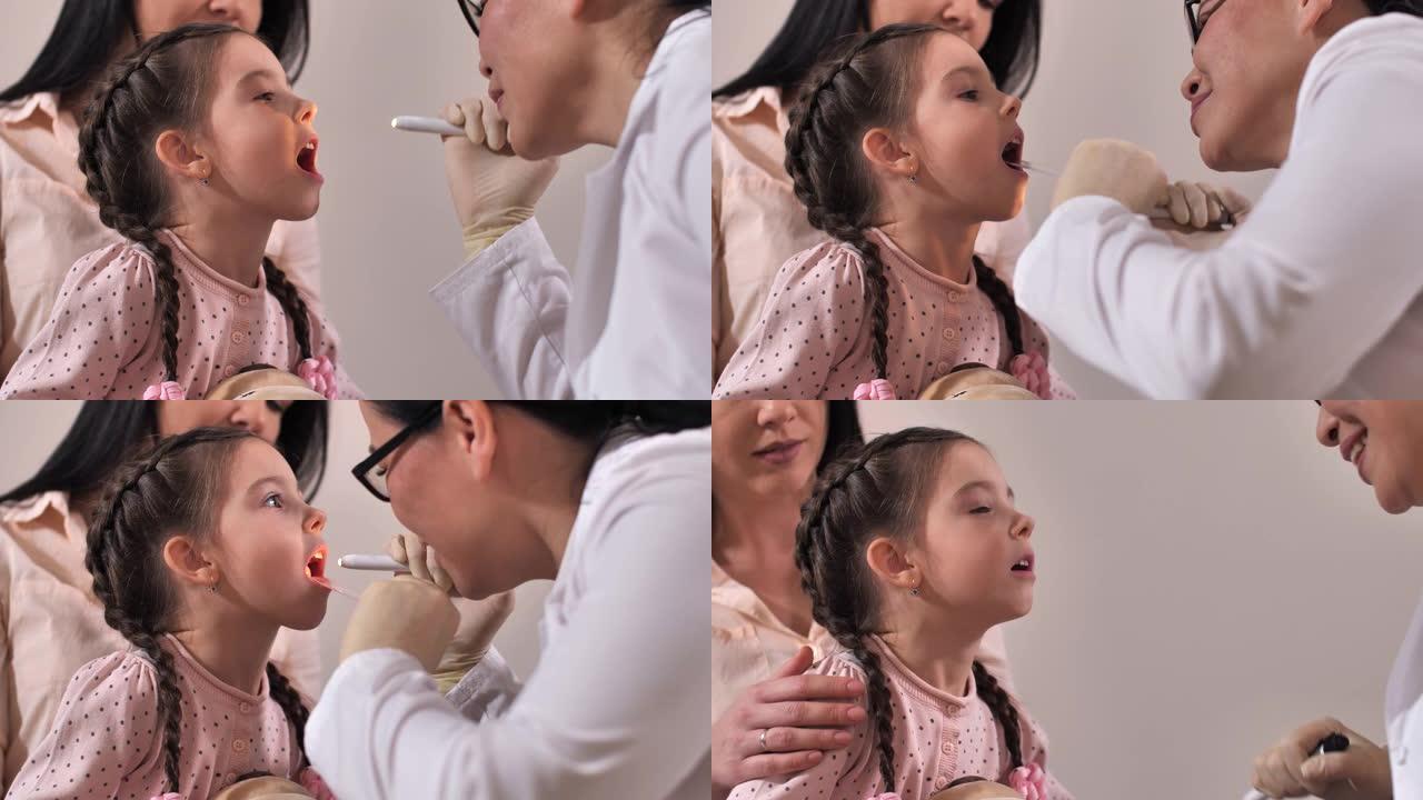 喉咙检查时的小女孩病人