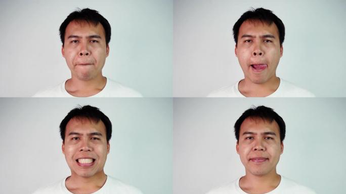 由于口干，在灰色背景上，生病的亚洲人舔嘴的特写肖像。男性面对流感症状。
